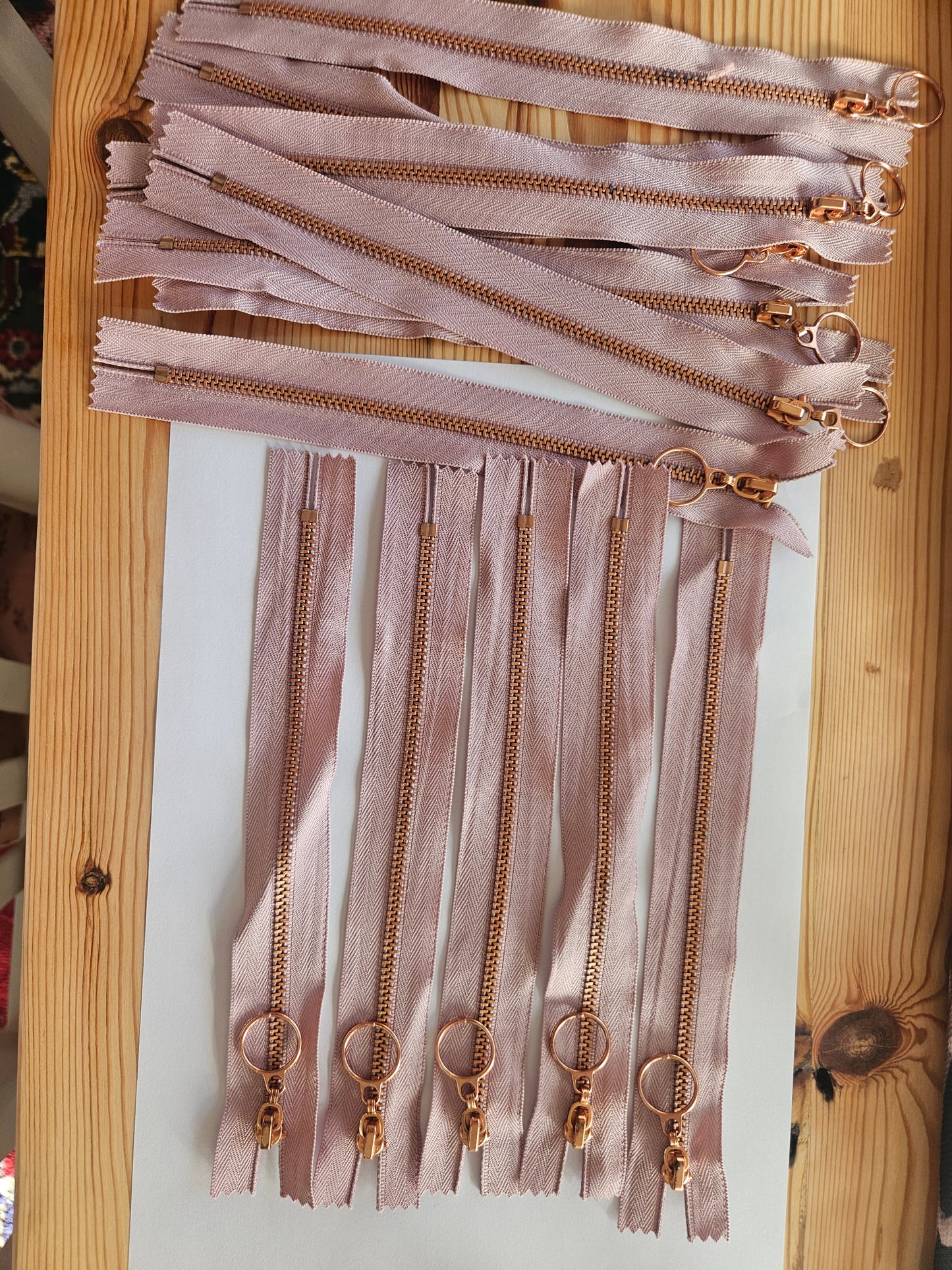 Rose gold and mauve zips
