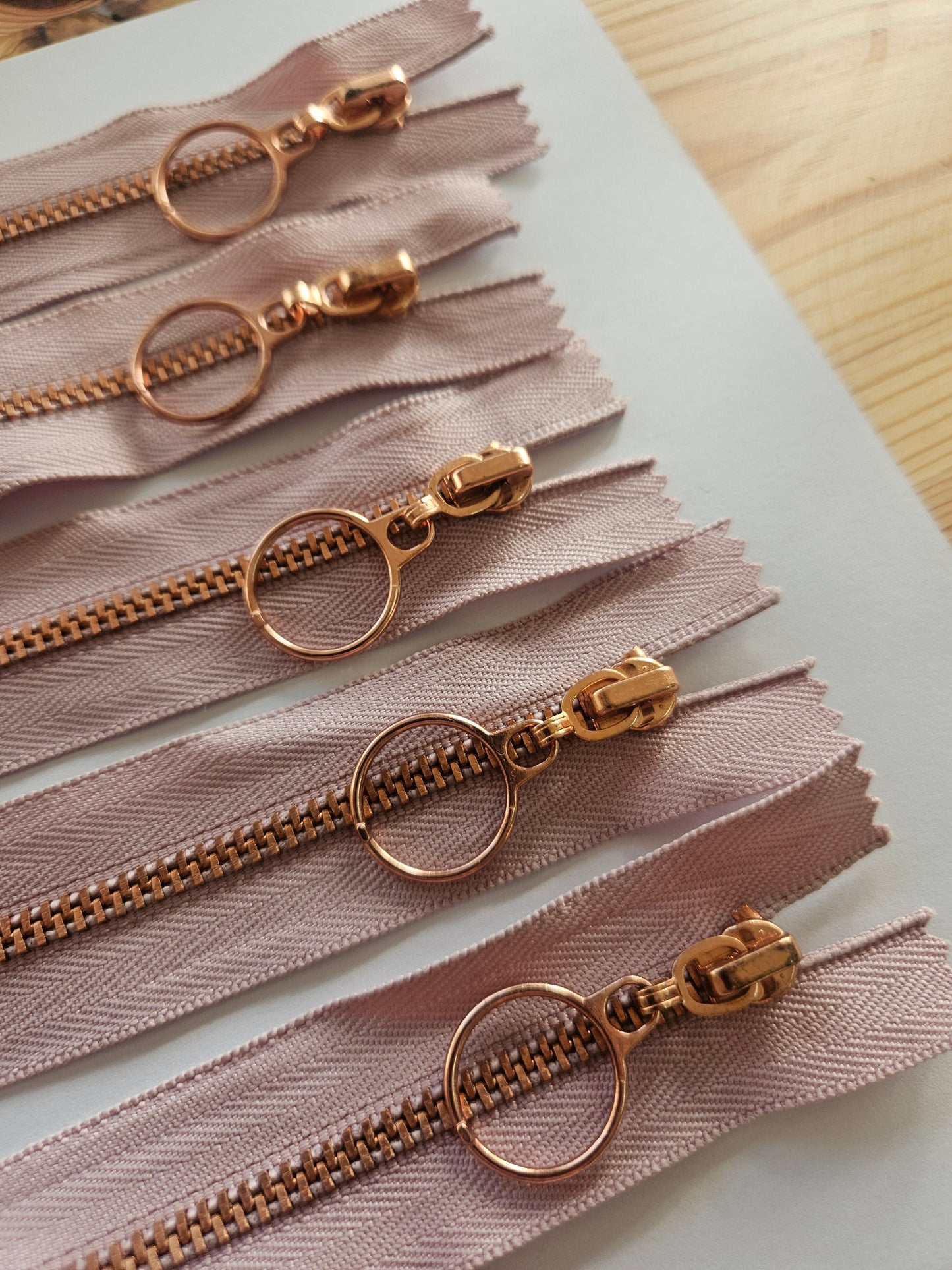 Rose gold and mauve zips