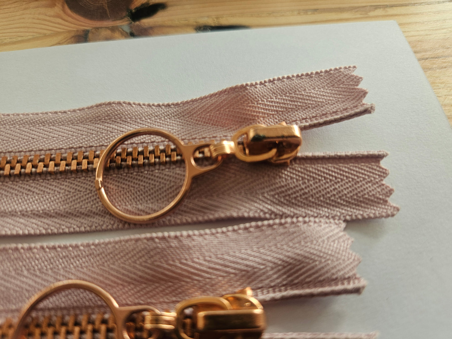 Rose gold and mauve zips