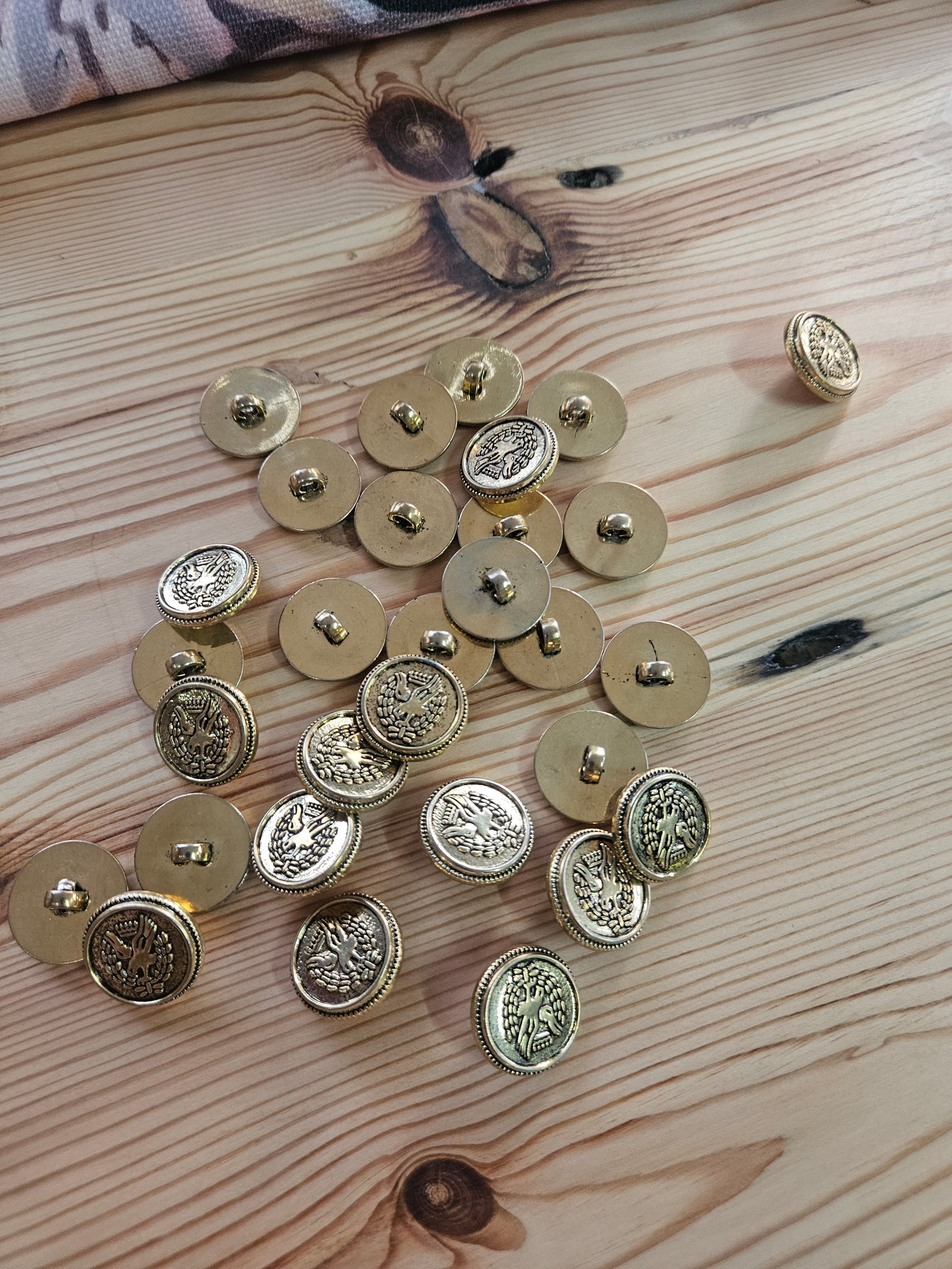 Gold plastic buttons