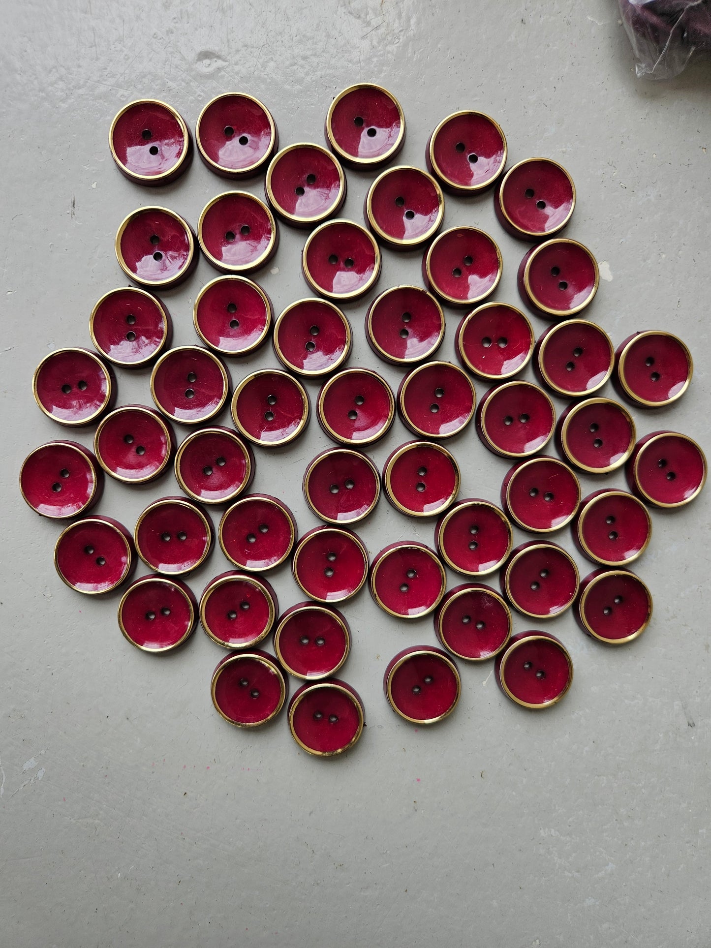 Burgundy and gold buttons