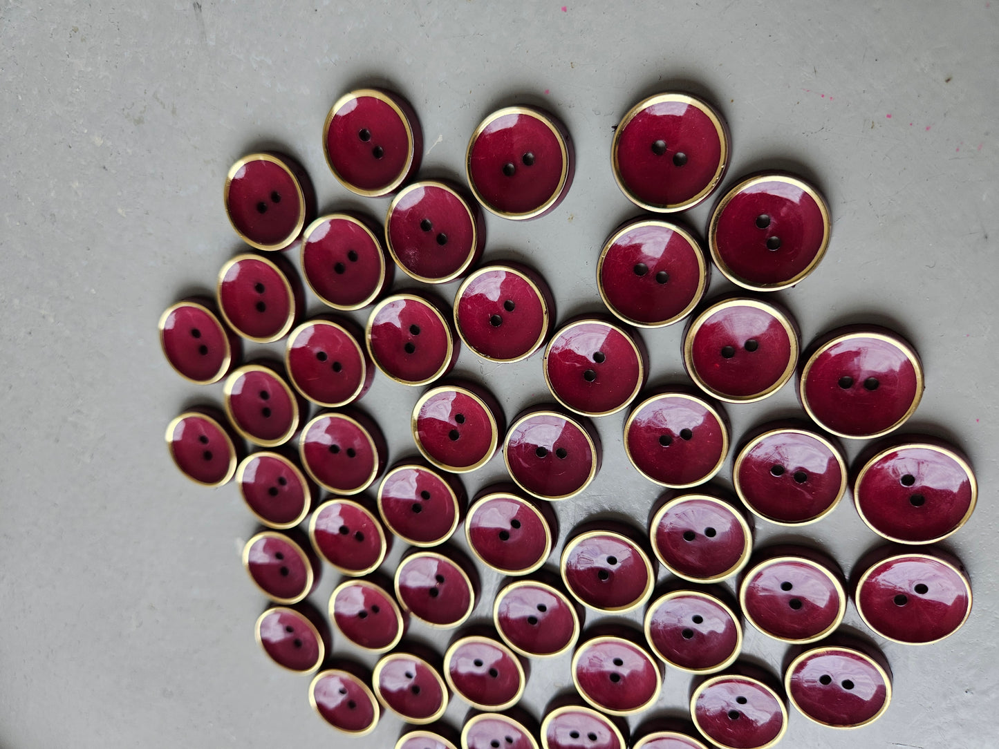 Burgundy and gold buttons