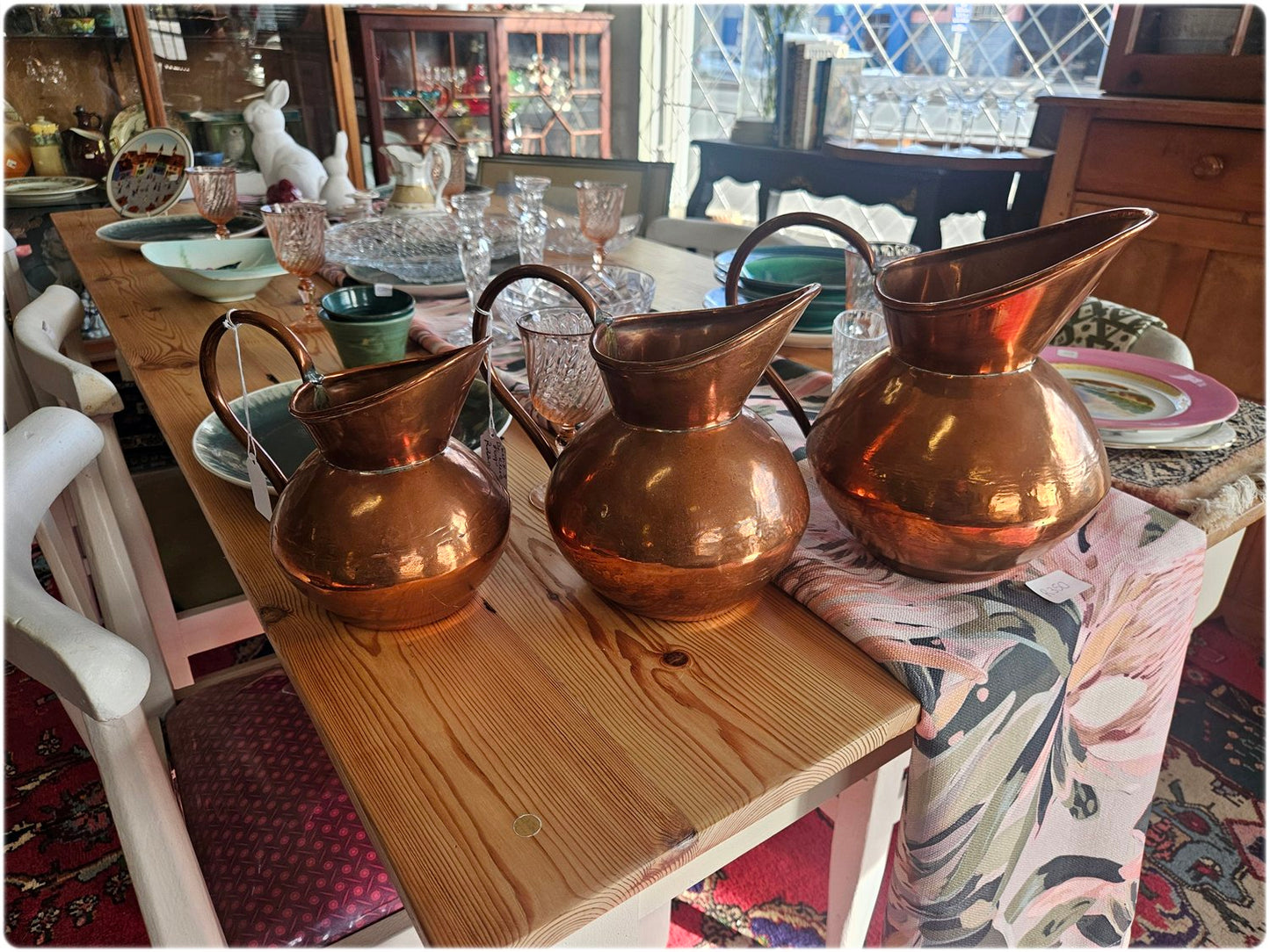 Graduated set of 3 De Klerk copper jugs