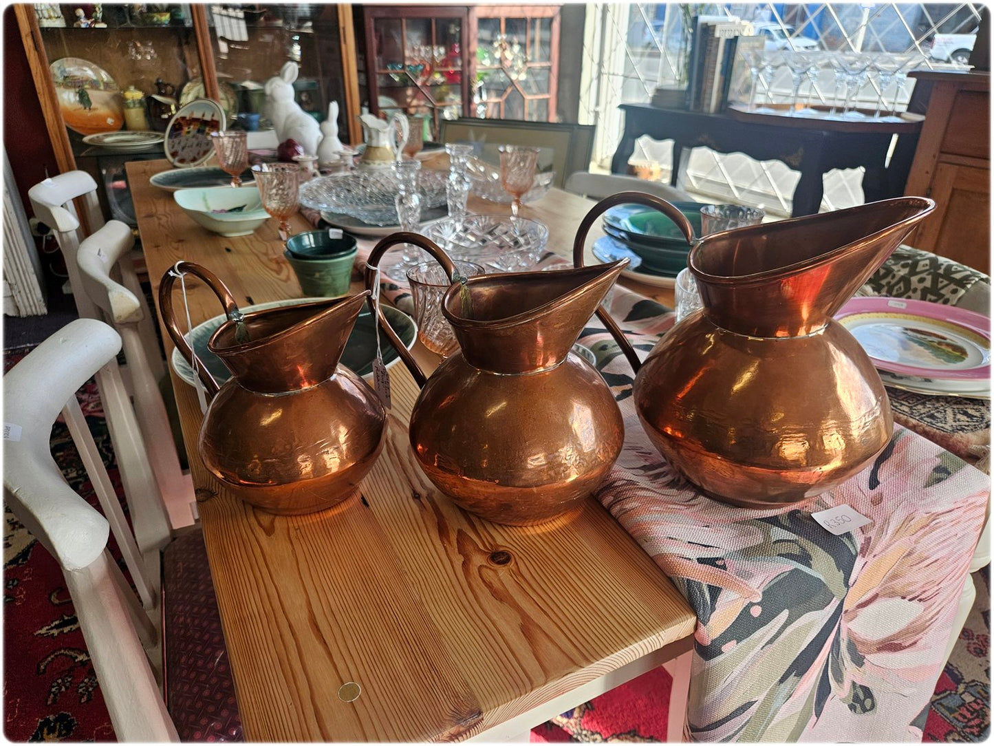 Graduated set of 3 De Klerk copper jugs