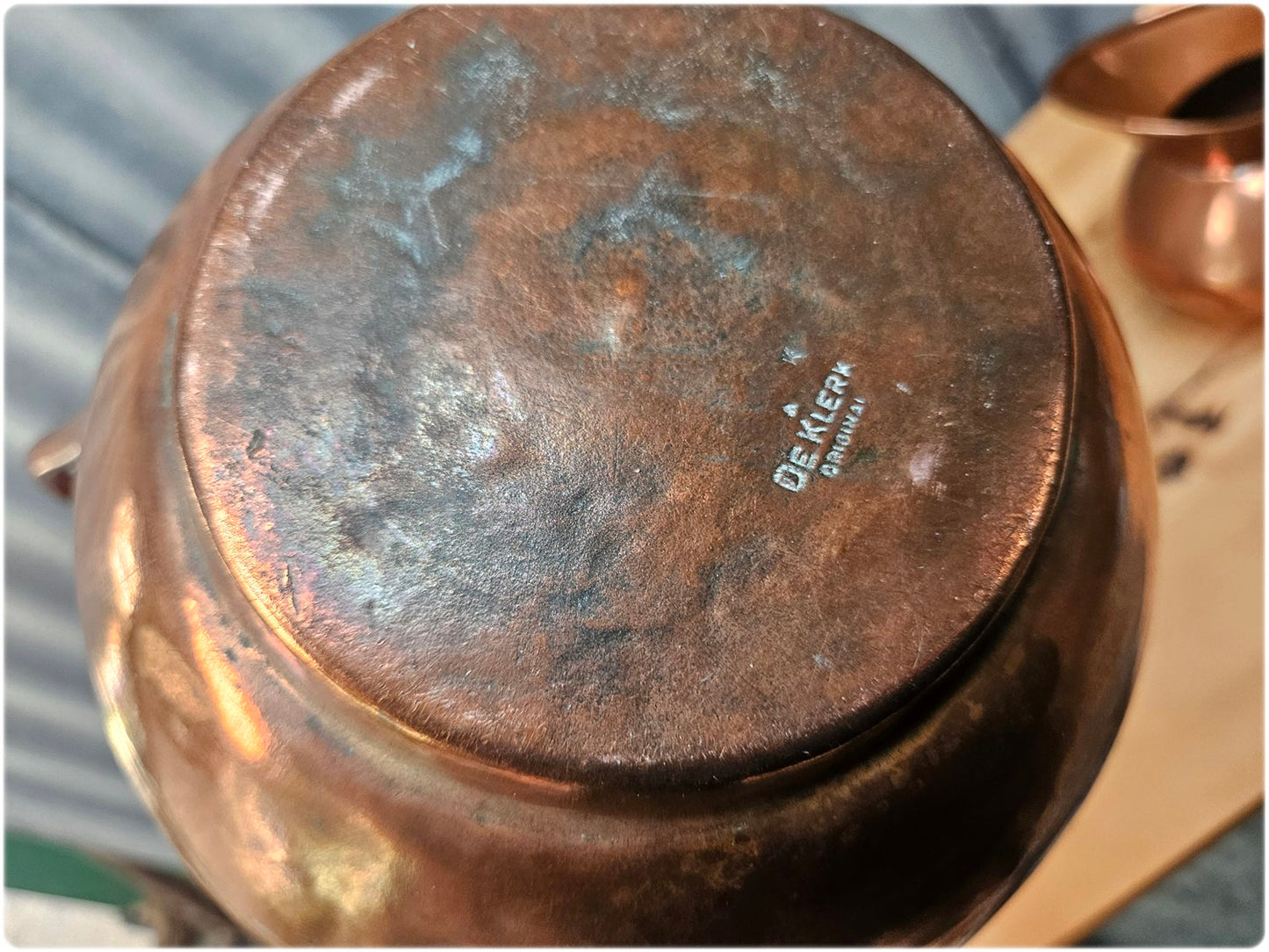 Graduated set of 3 De Klerk copper jugs