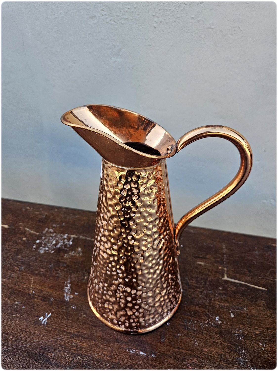 Mid-century hammered copper pitcher