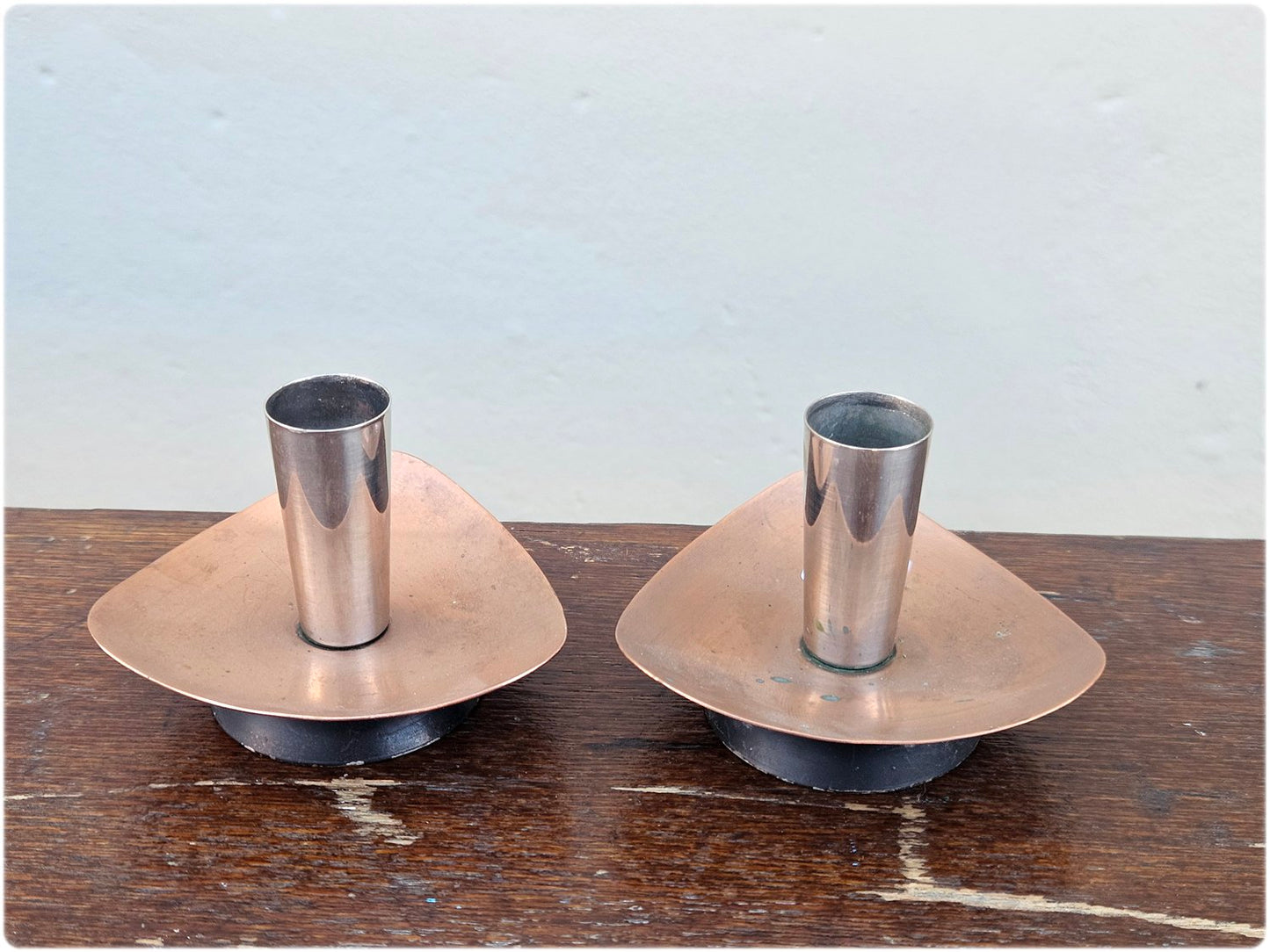 Pair of mid-century copper and stainless steel candlesticks