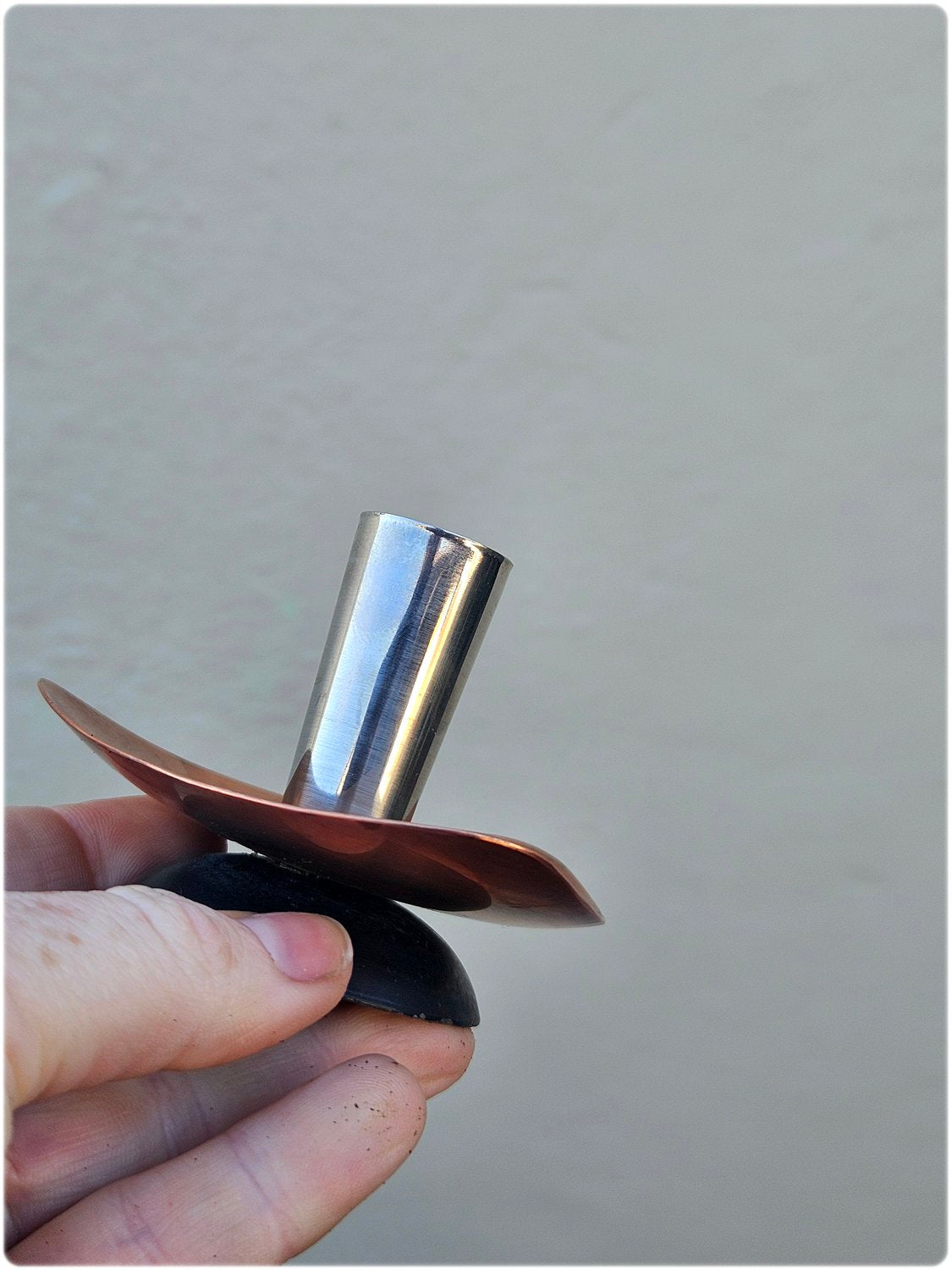 Pair of mid-century copper and stainless steel candlesticks