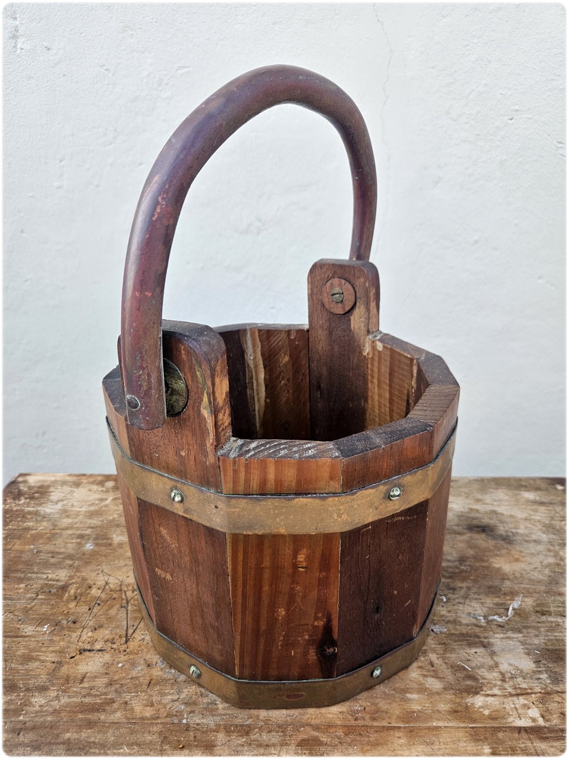 Wooden bucket with copper details