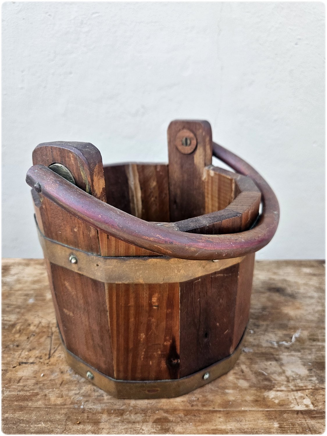 Wooden bucket with copper details