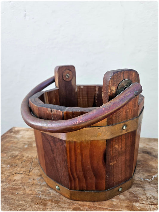 Wooden bucket with copper details
