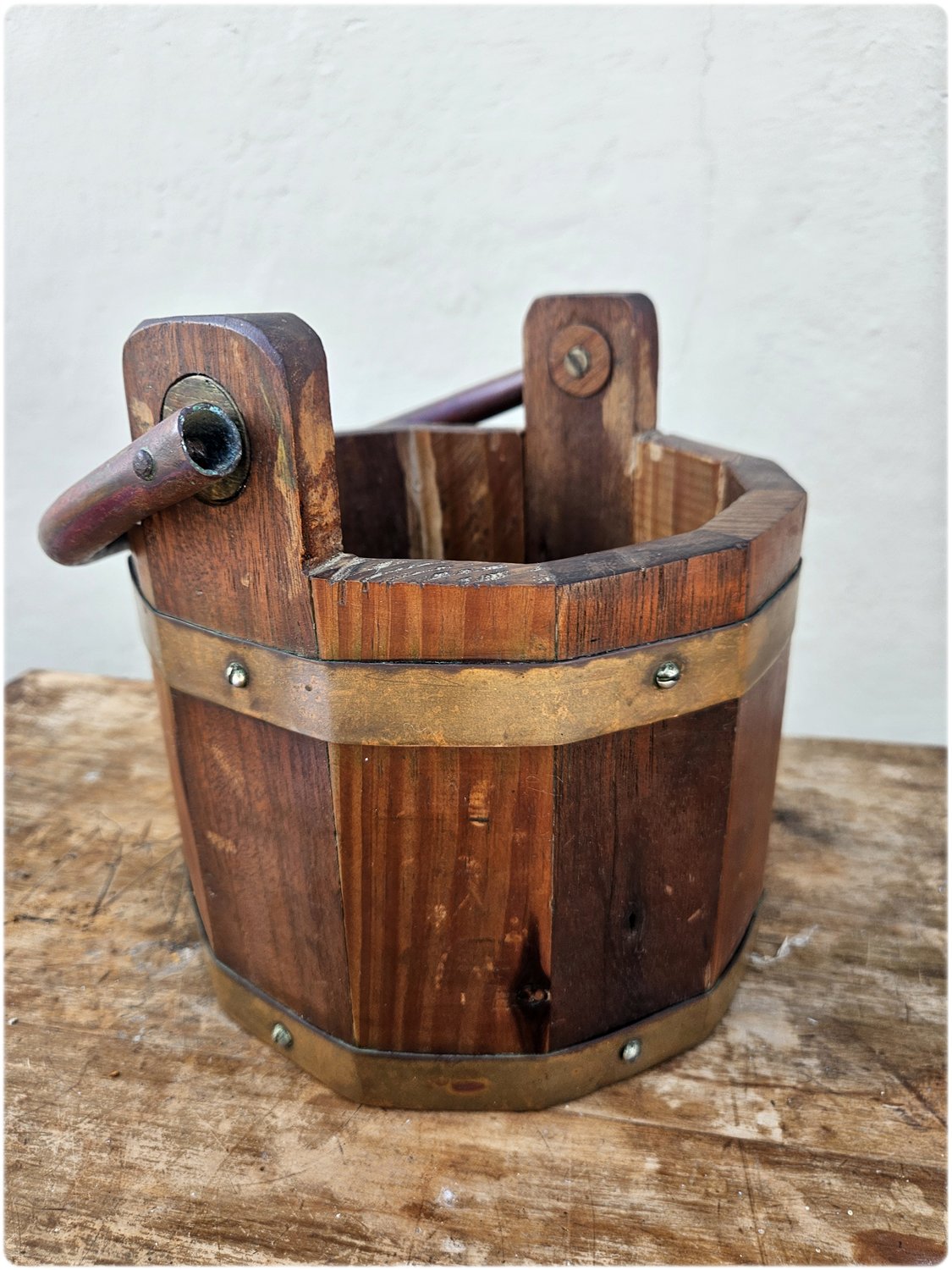 Wooden bucket with copper details