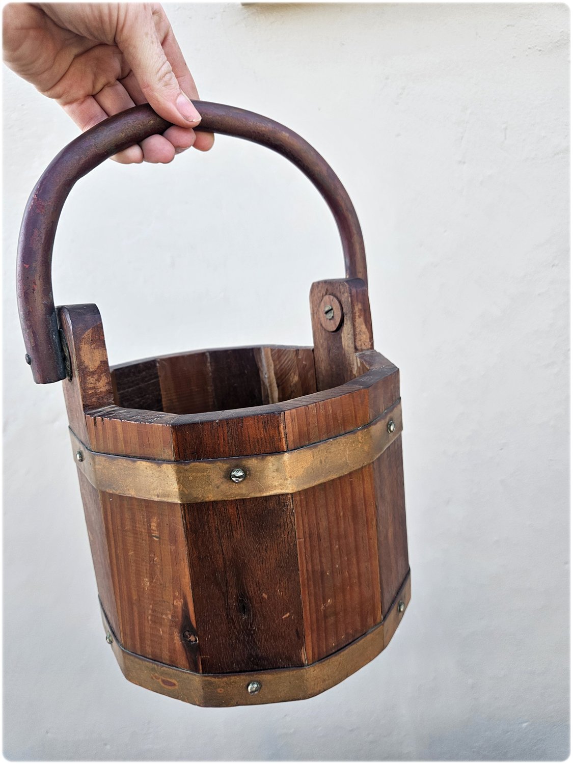 Wooden bucket with copper details