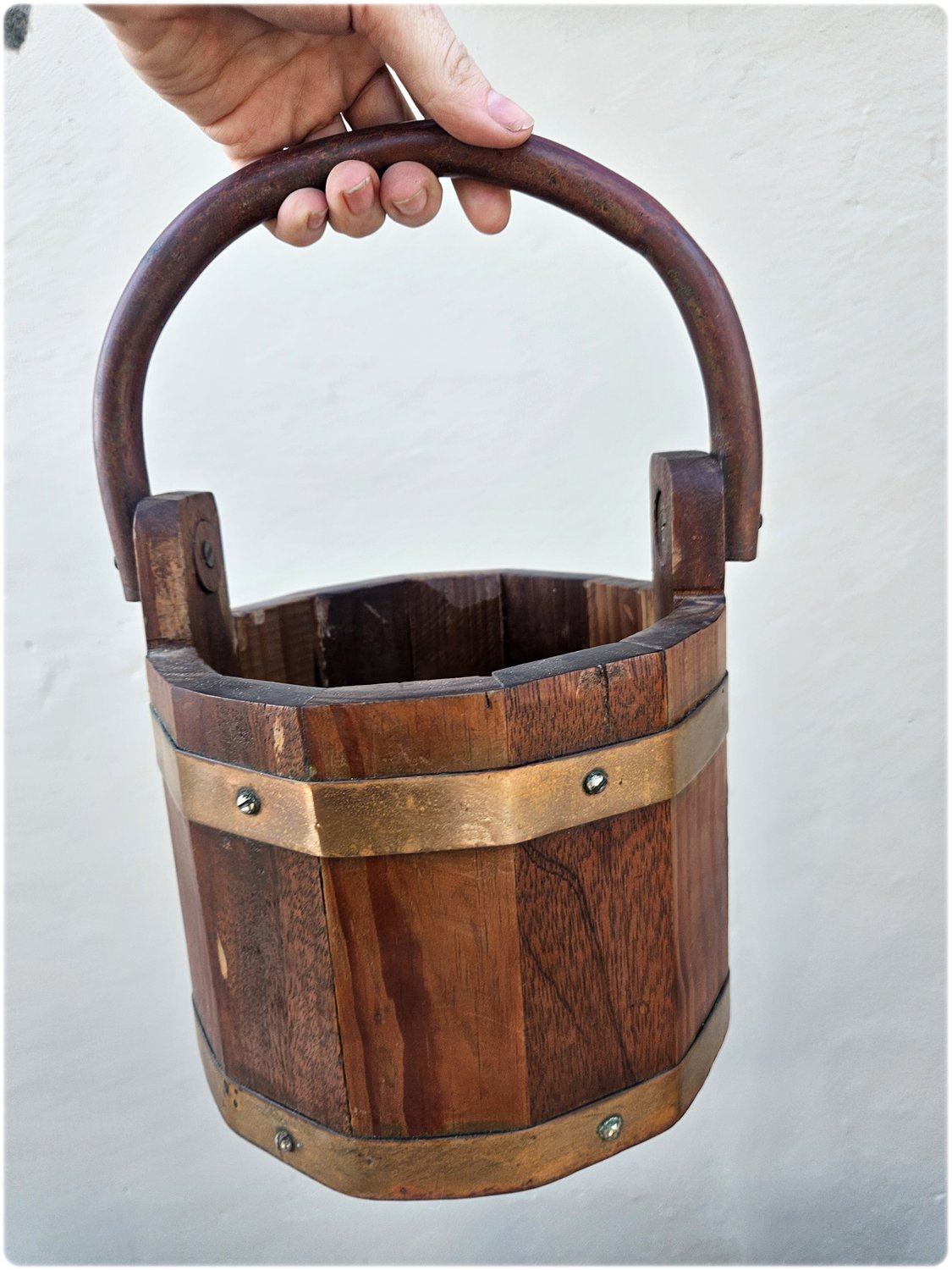 Wooden bucket with copper details