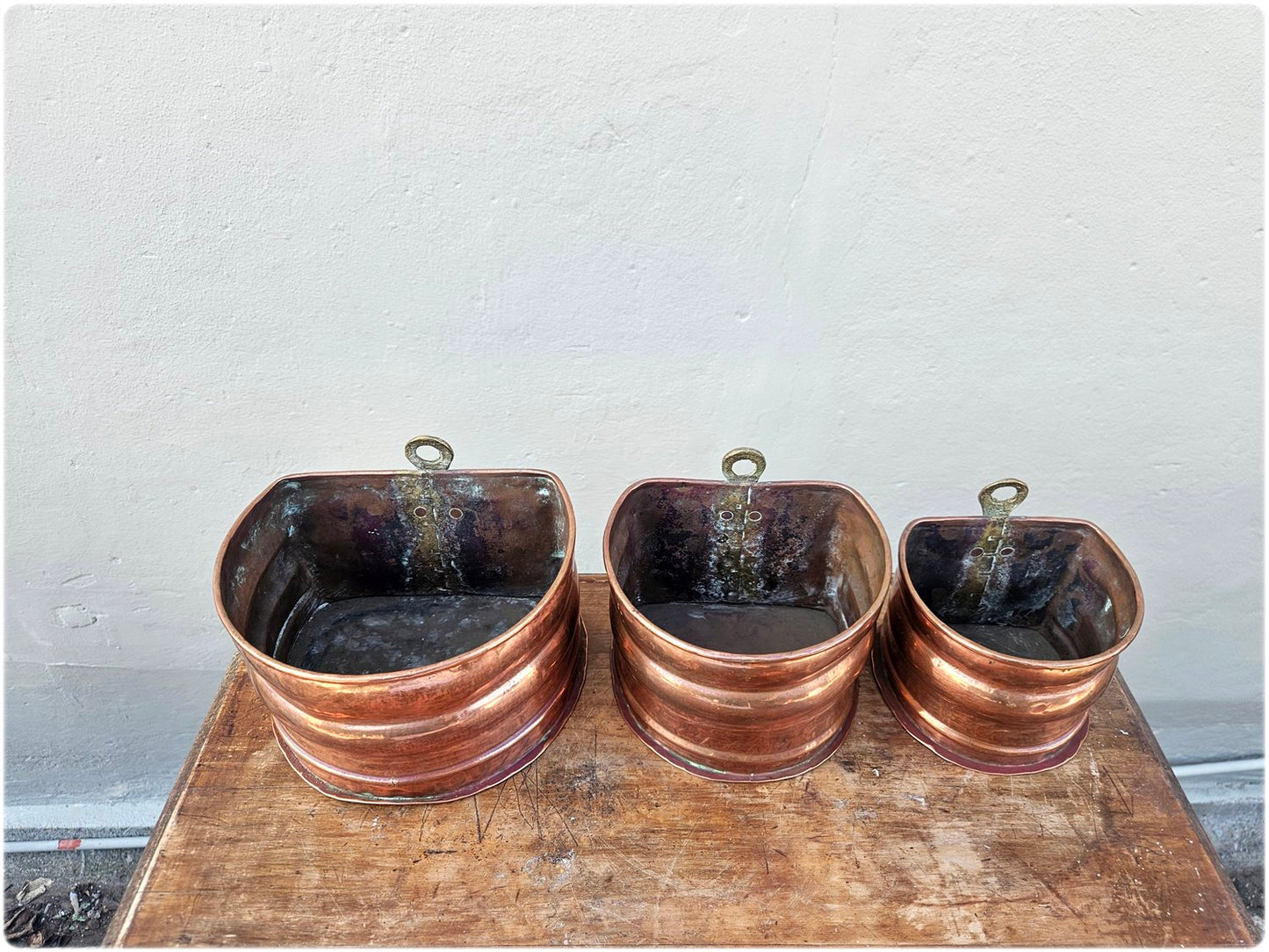 Graduated set of 3 copper and brass wall pocket planters