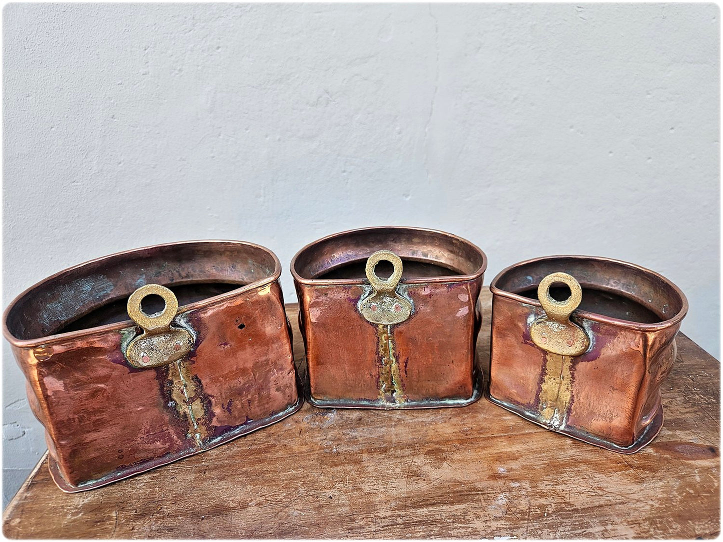 Graduated set of 3 copper and brass wall pocket planters