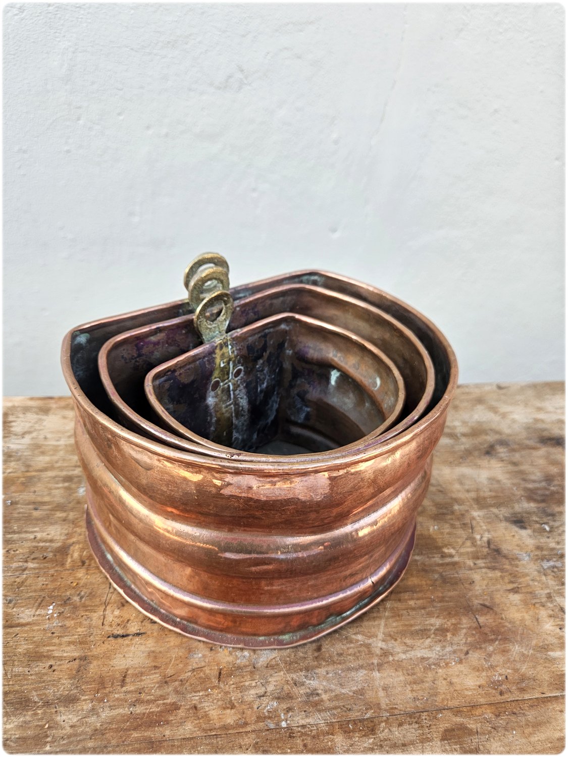 Graduated set of 3 copper and brass wall pocket planters
