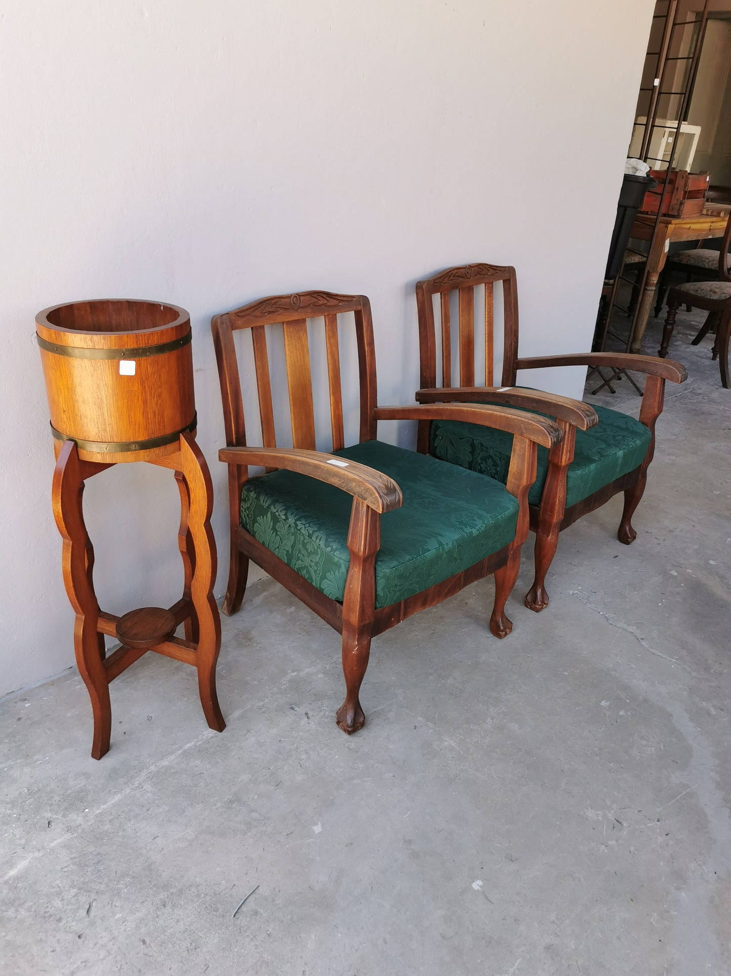 Pair of wooden arm chairs