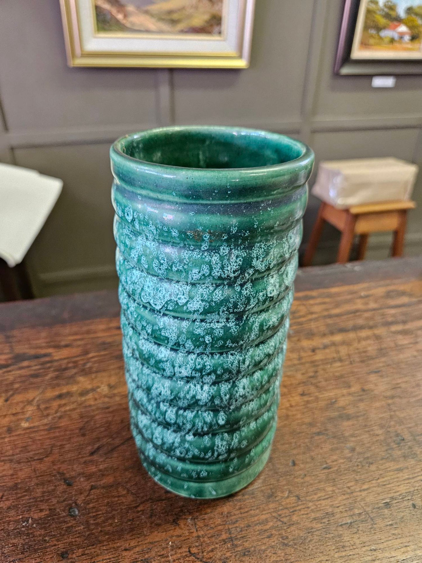 Green cylindrical vase