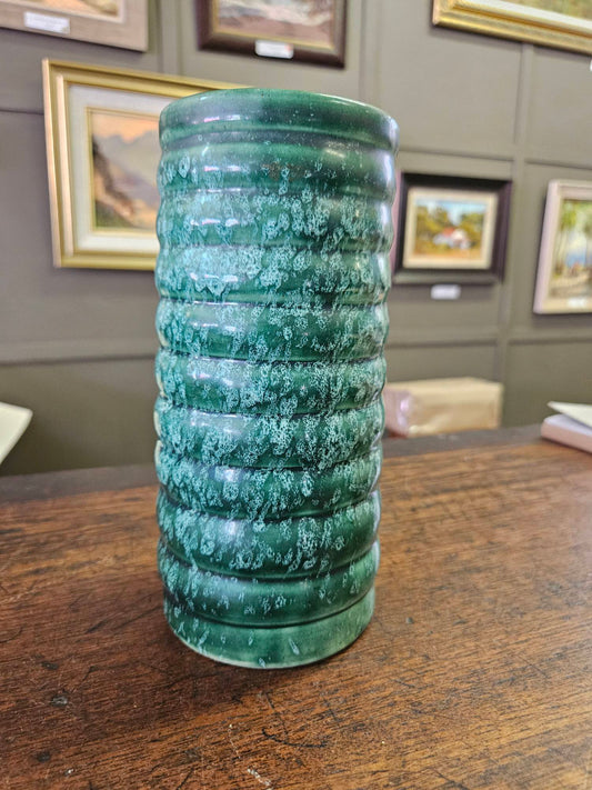 Green cylindrical vase