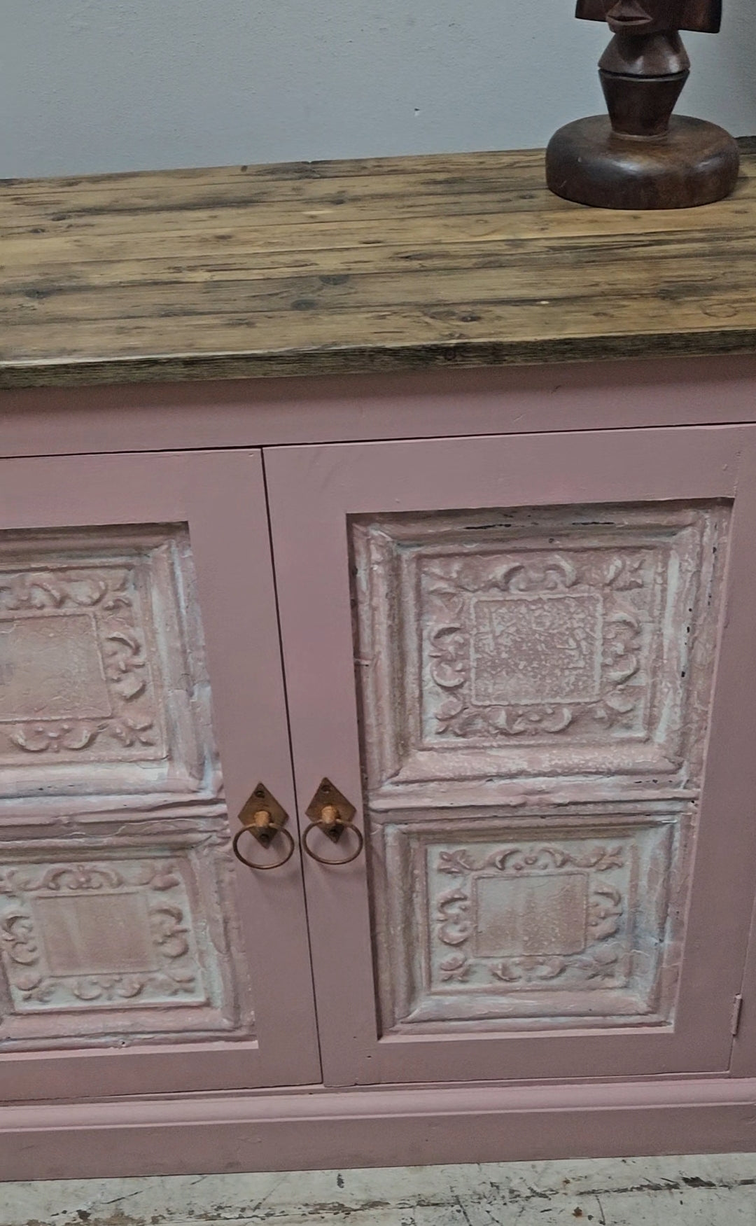 Base cabinet with iron paneled doors