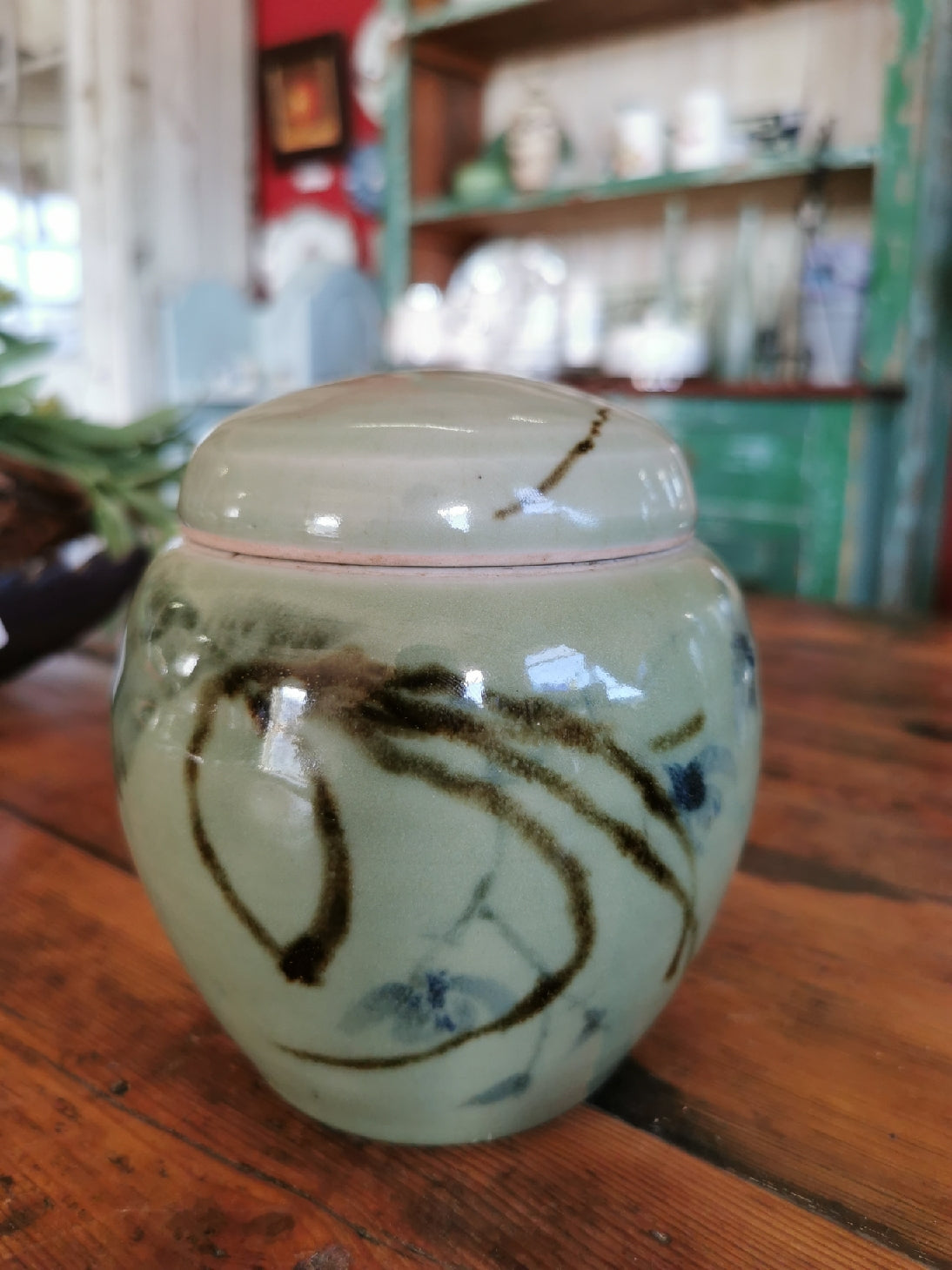 Green pottery ginger jar