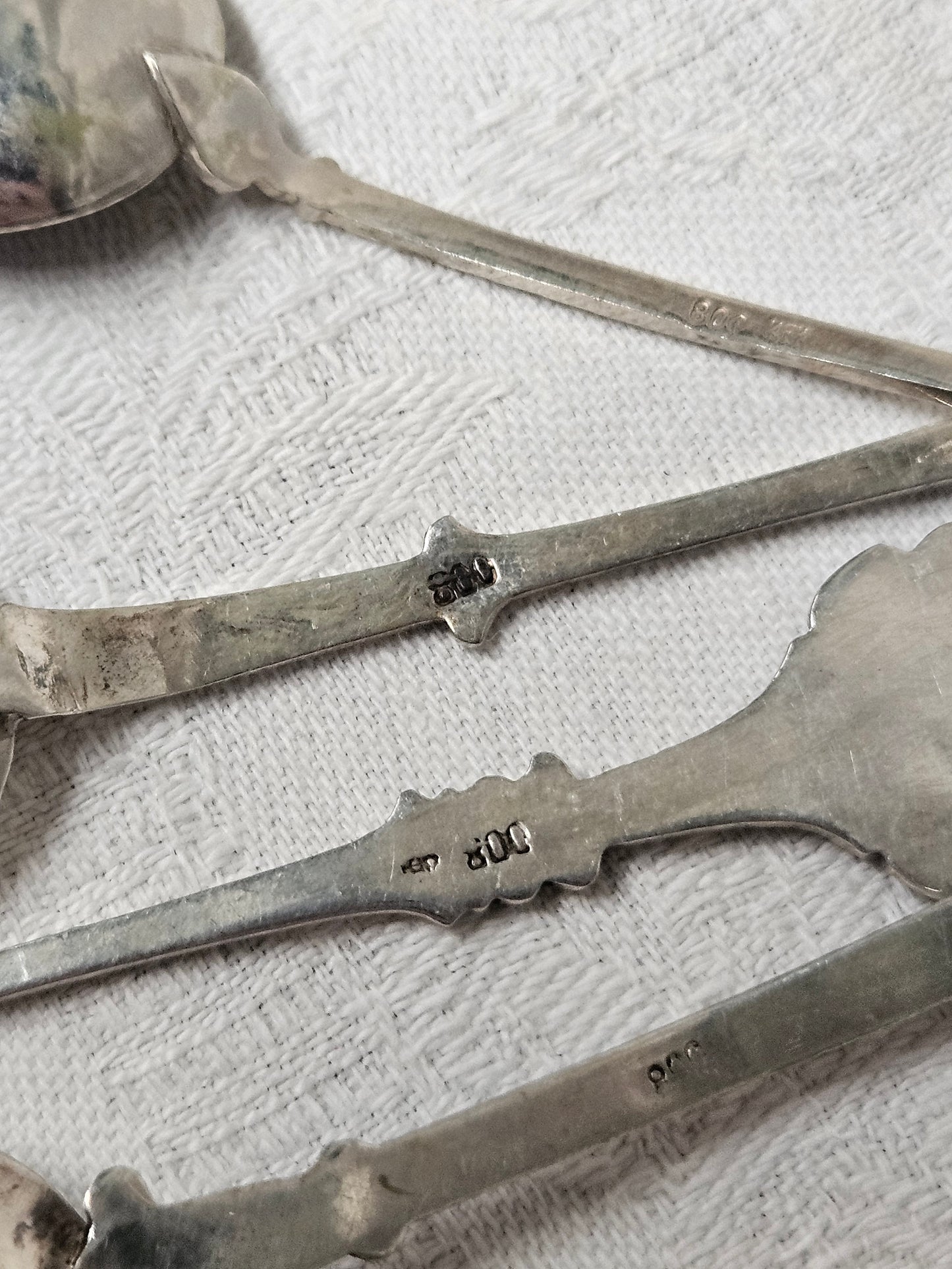 10x souvenir spoons