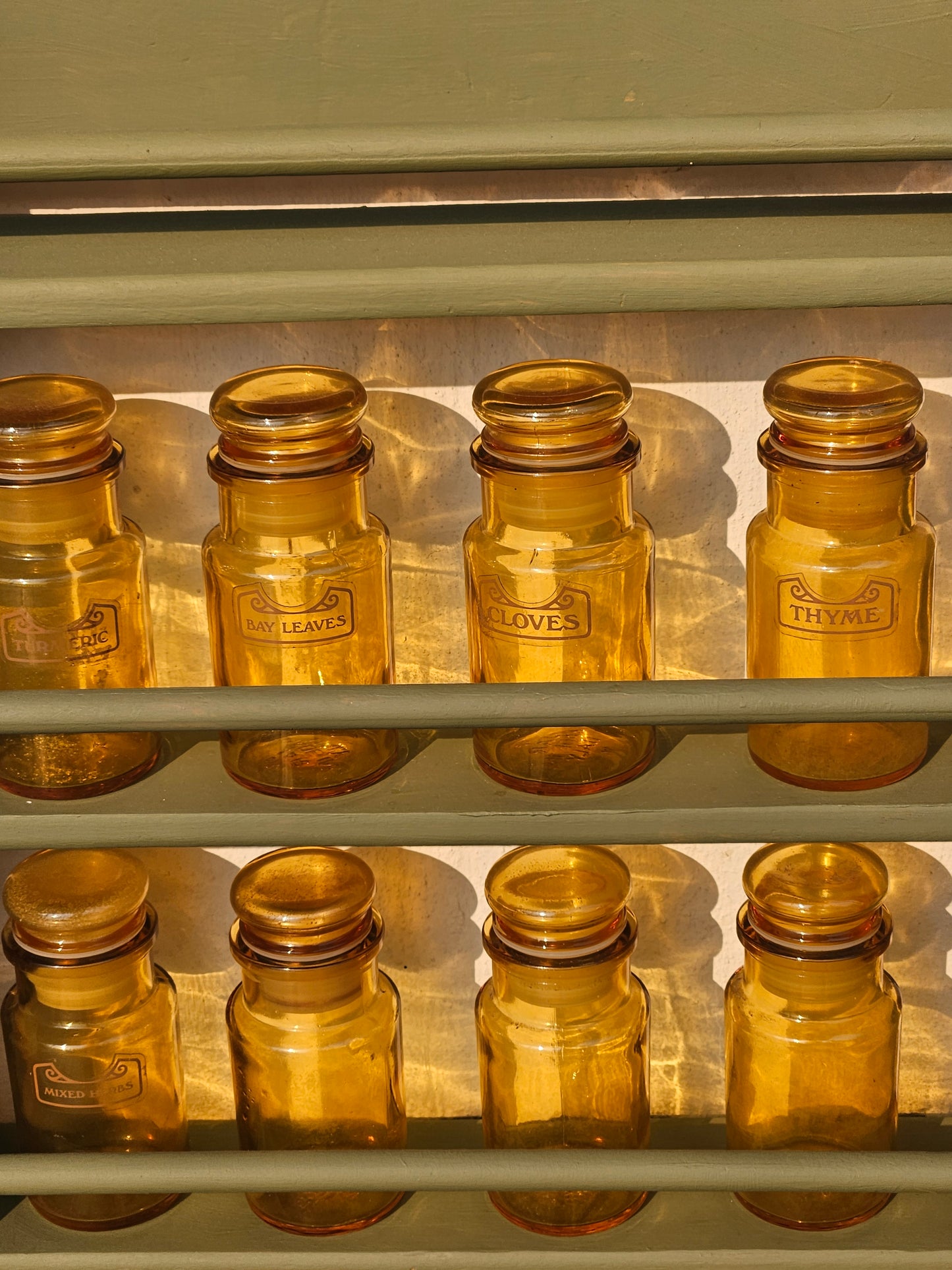 Spice bottles on rack