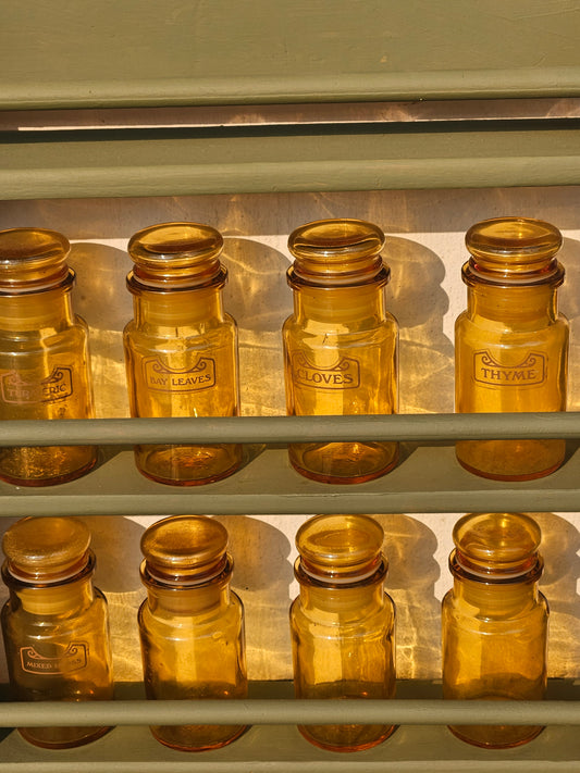 Spice bottles on rack