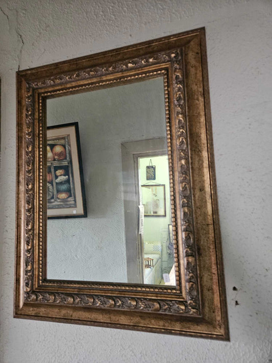 Gold framed mirror