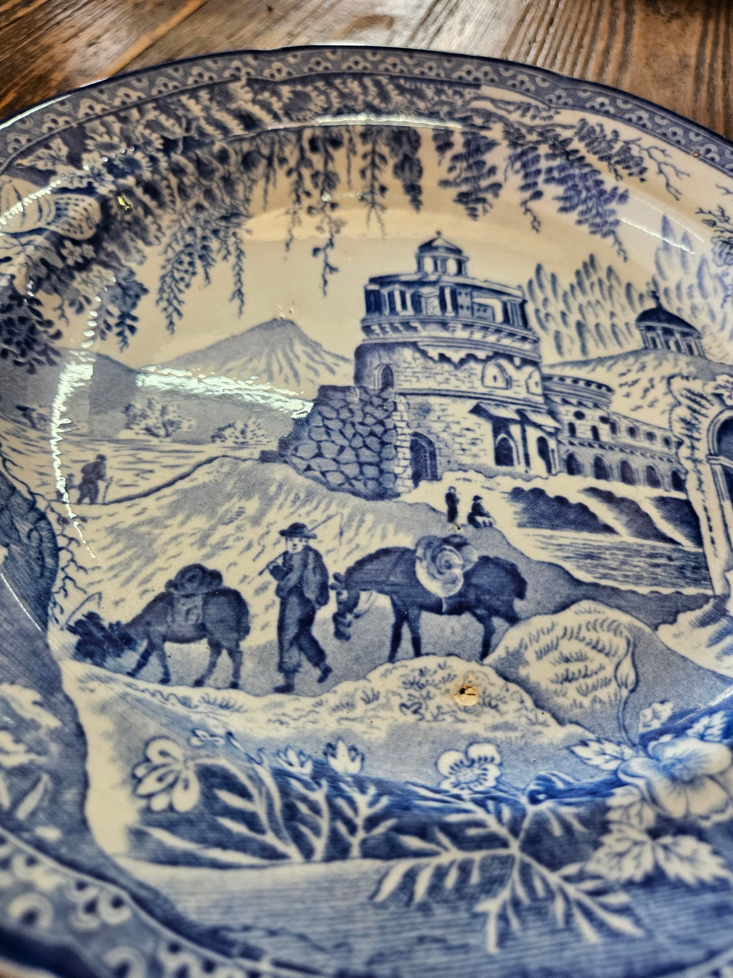 Blue and white plate with horse