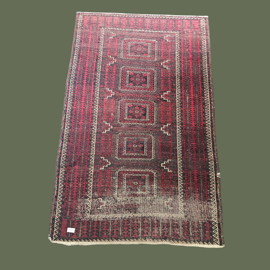 Worn Persian carpet