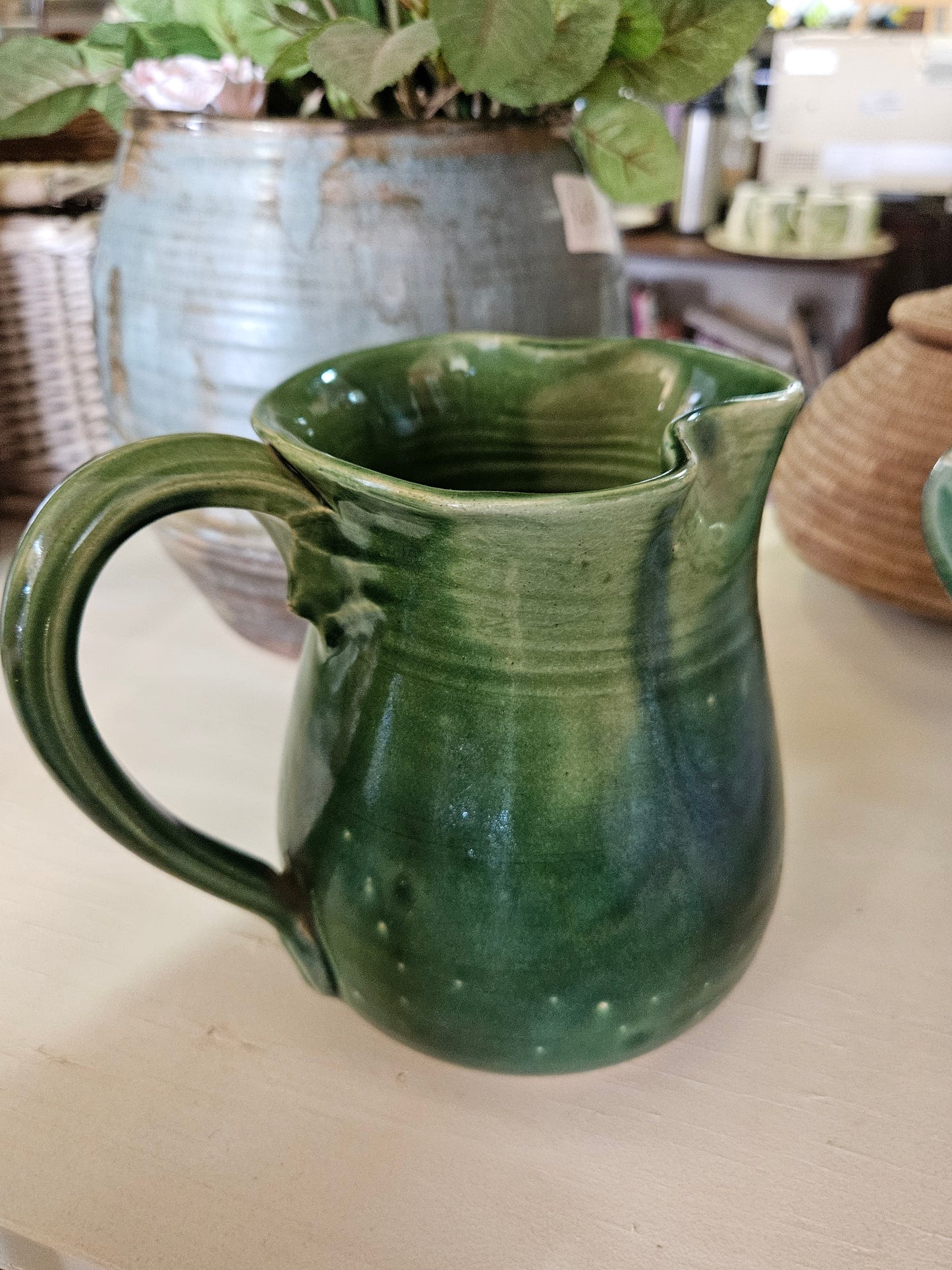 Green pottery jug