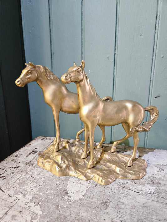 Brass horses figurine