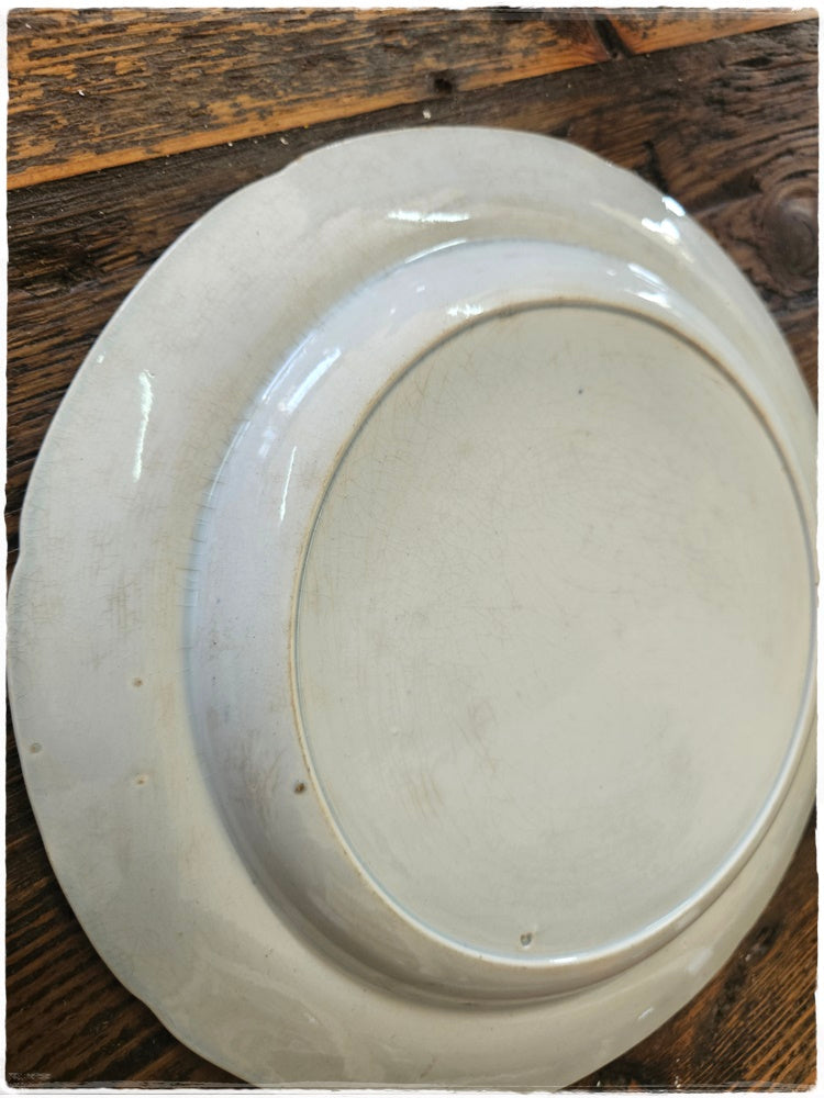 Blue and white plate with horse
