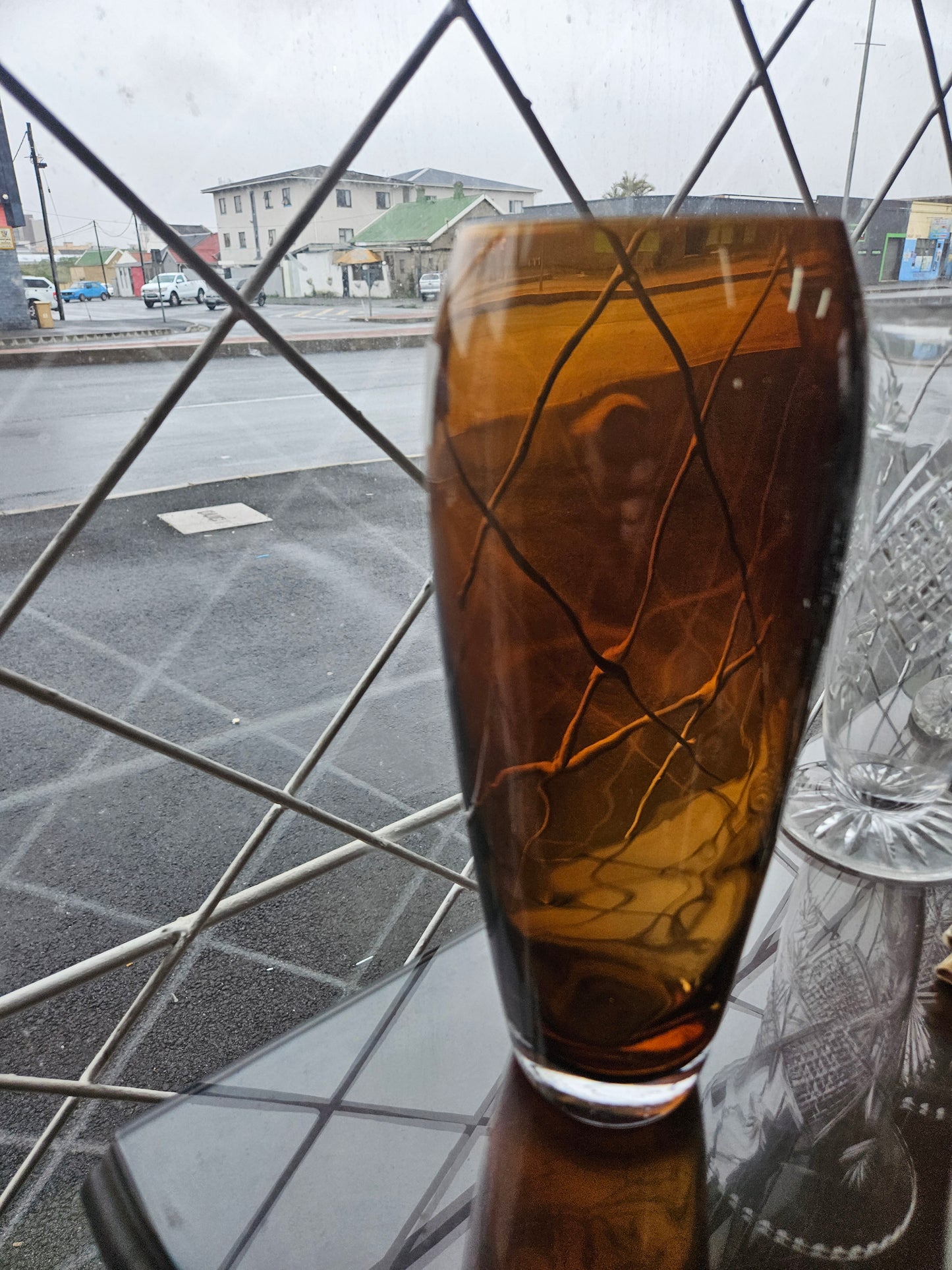 Tall amber glass vase