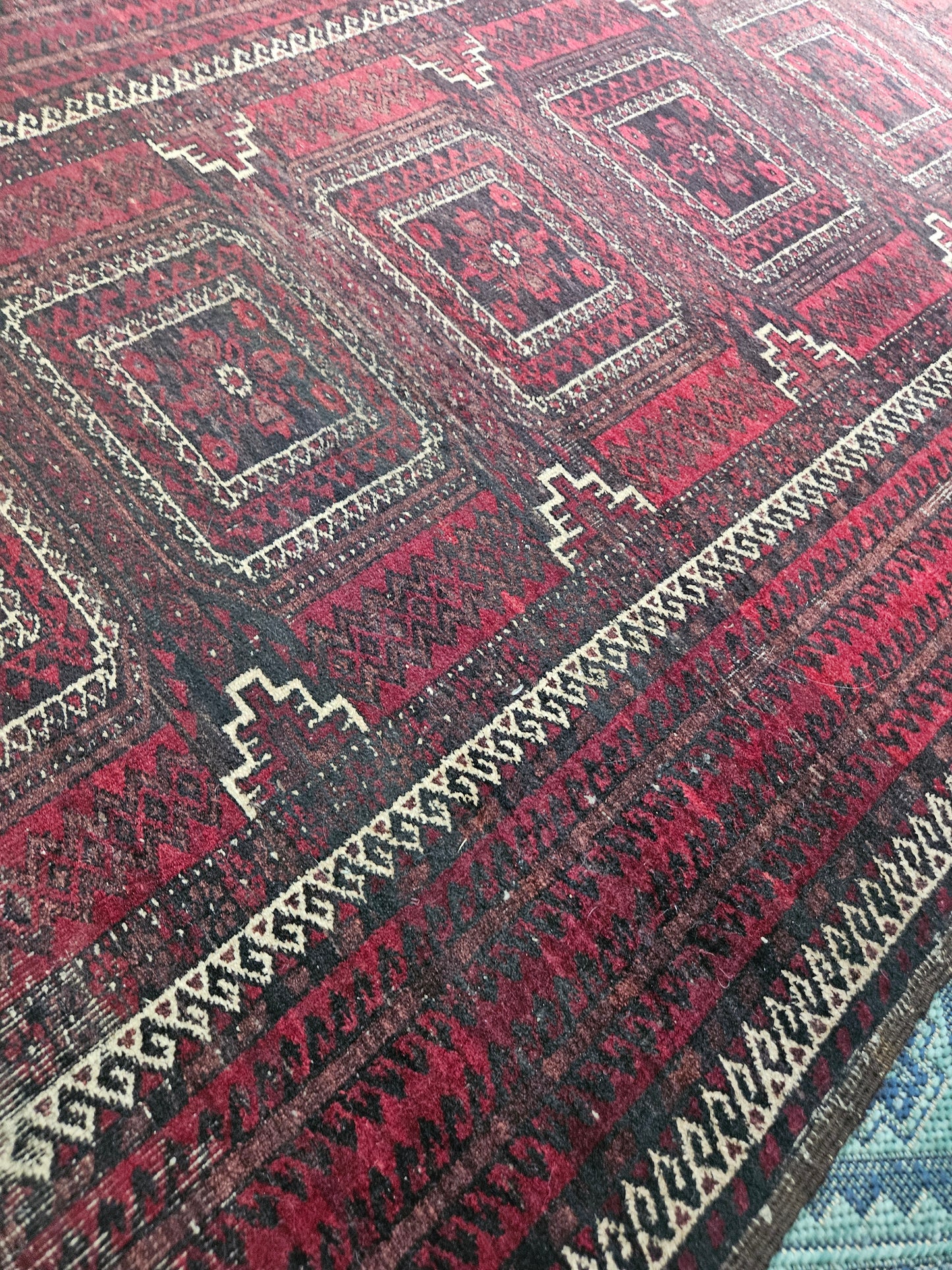Worn Persian carpet