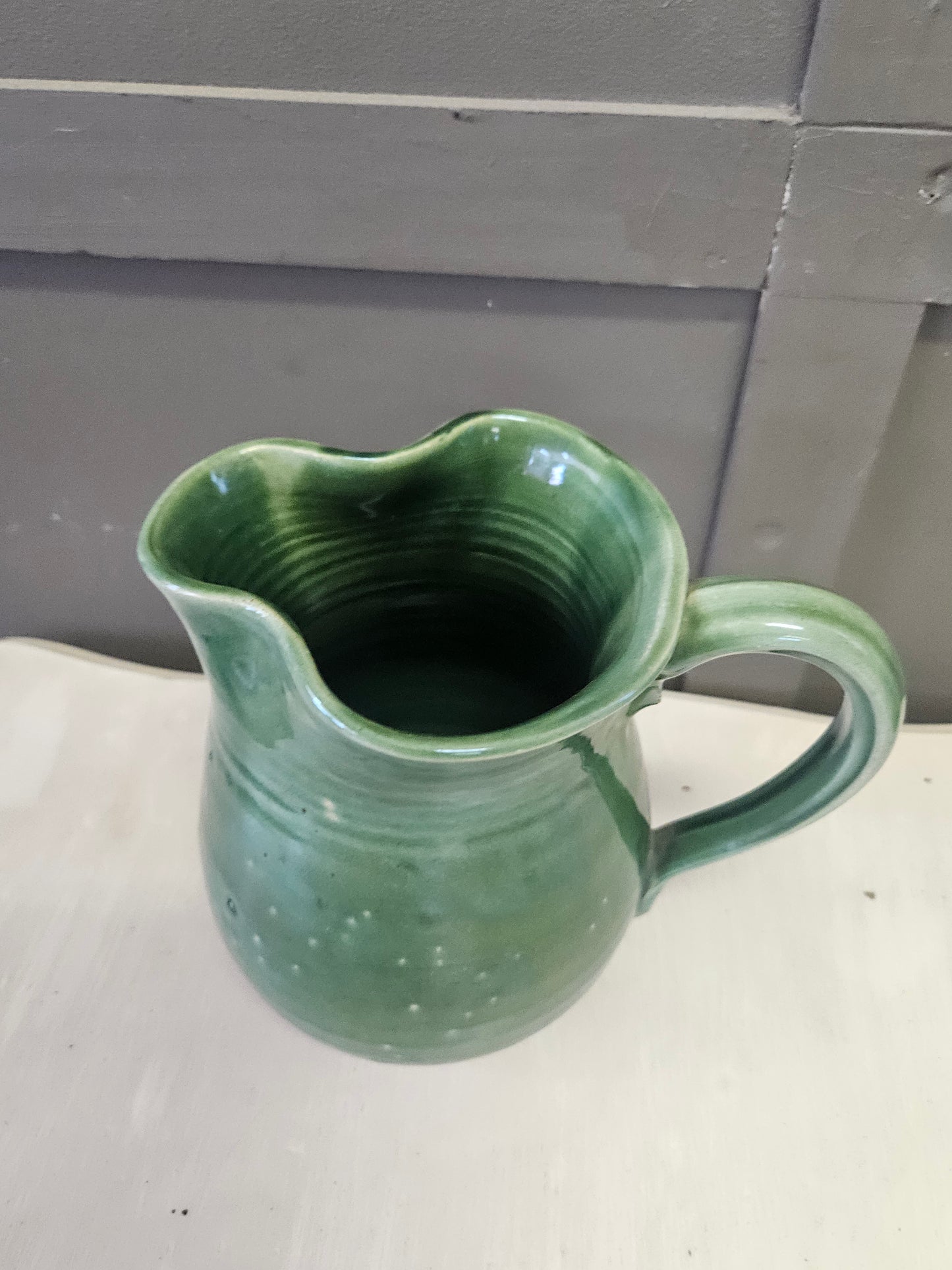 Green pottery jug