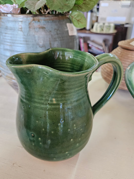 Green pottery jug
