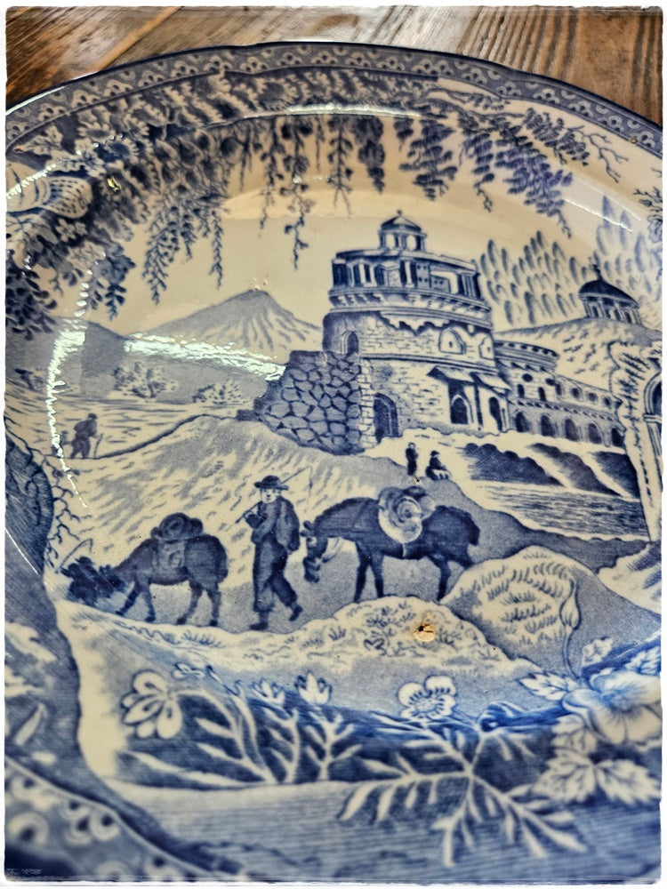 Blue and white plate with horse