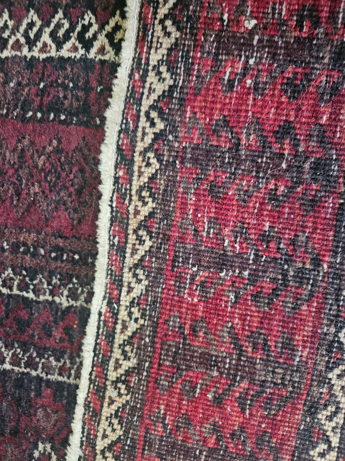 Worn Persian carpet