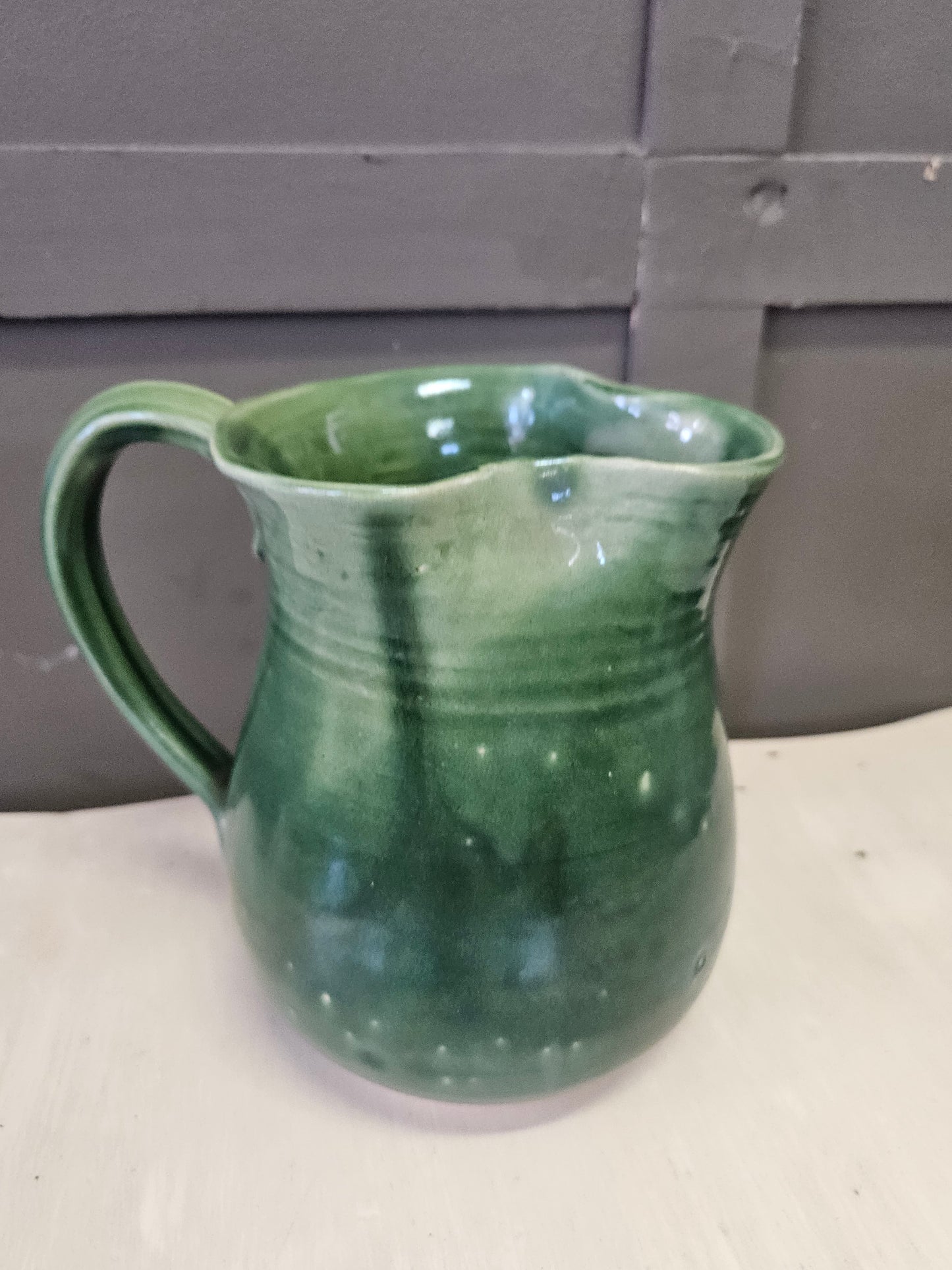 Green pottery jug