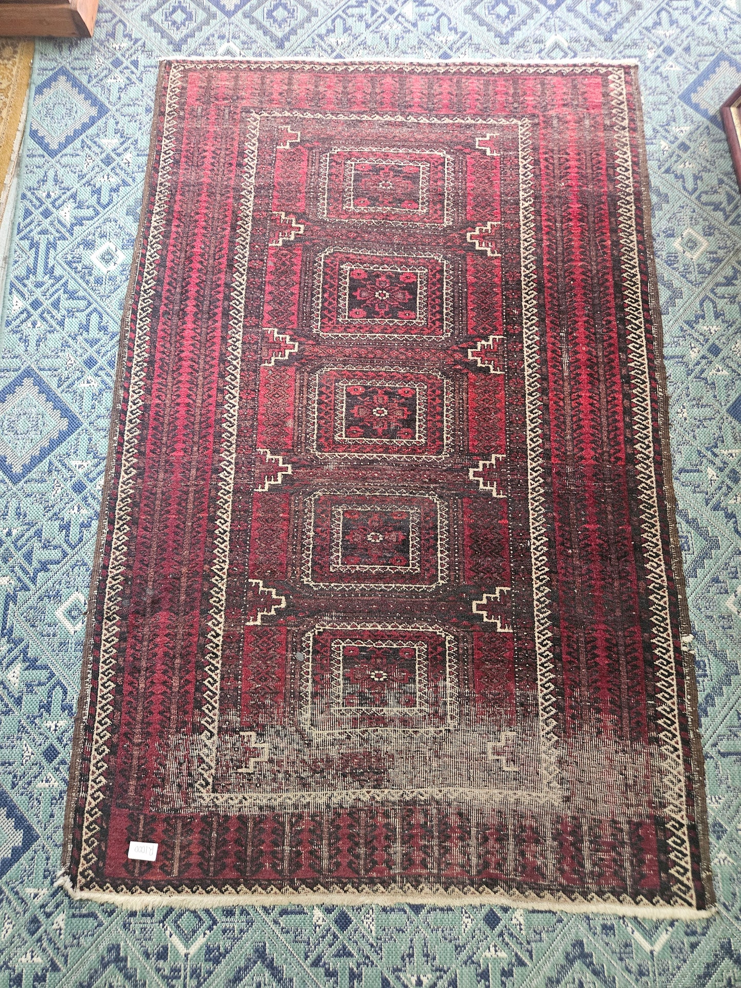 Worn Persian carpet