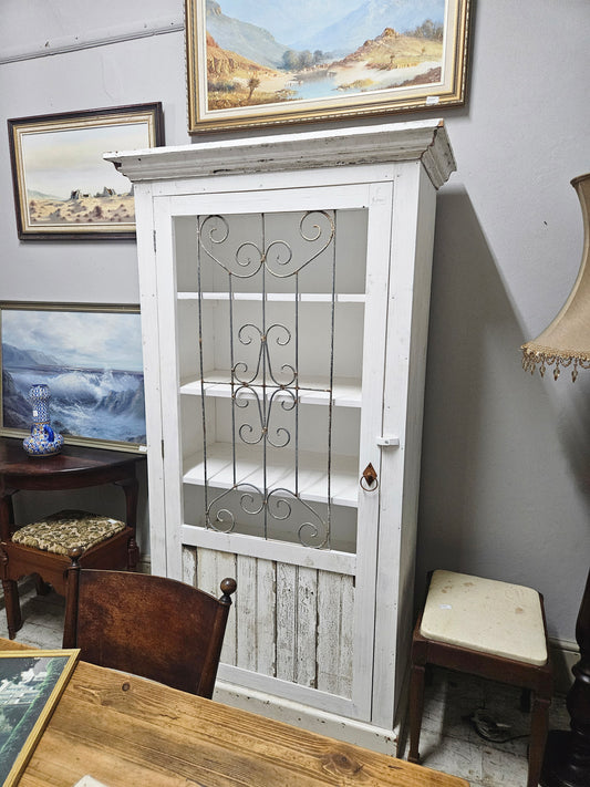 Rustic burglar bar cupboard