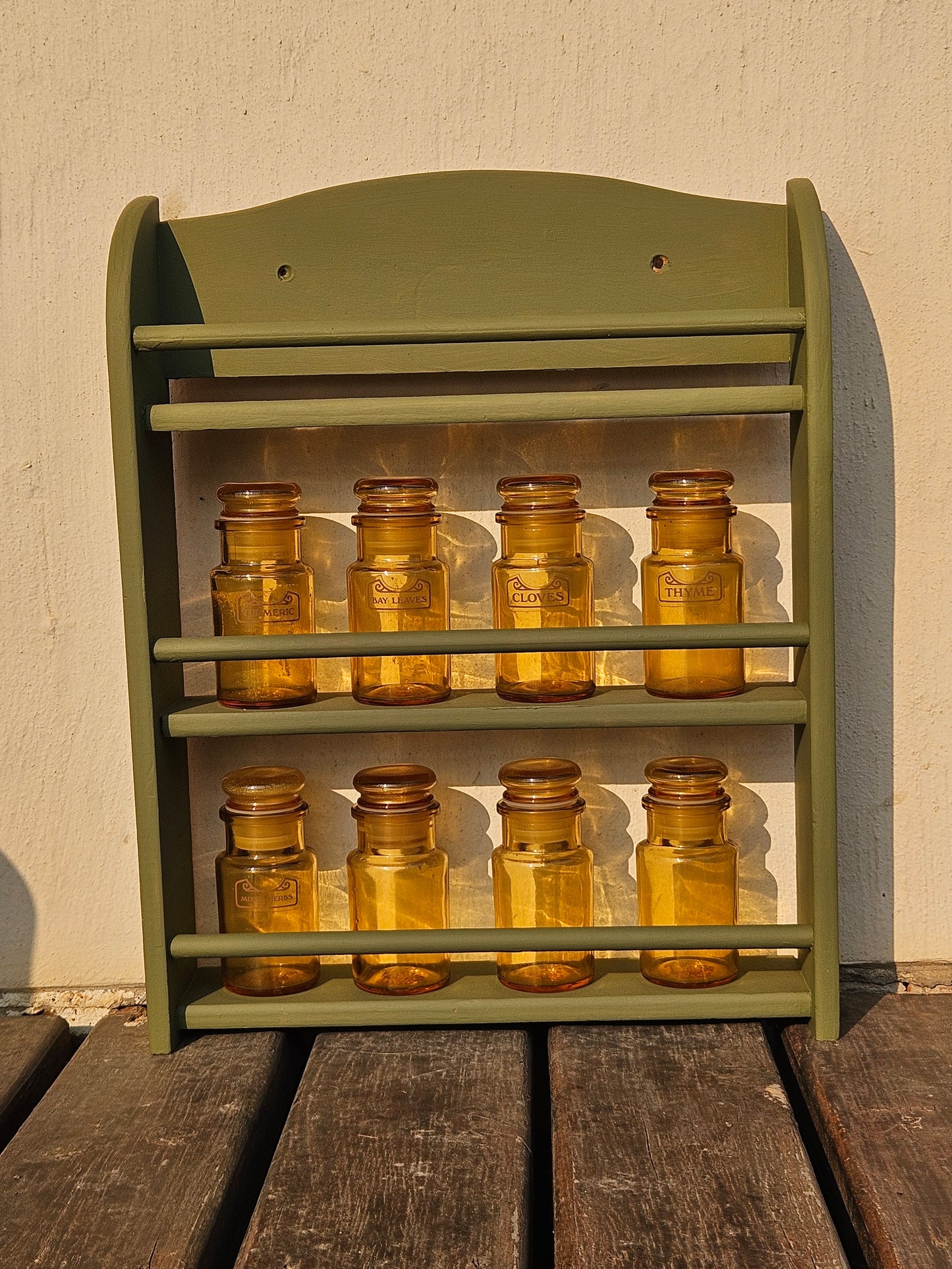 Spice bottles on rack
