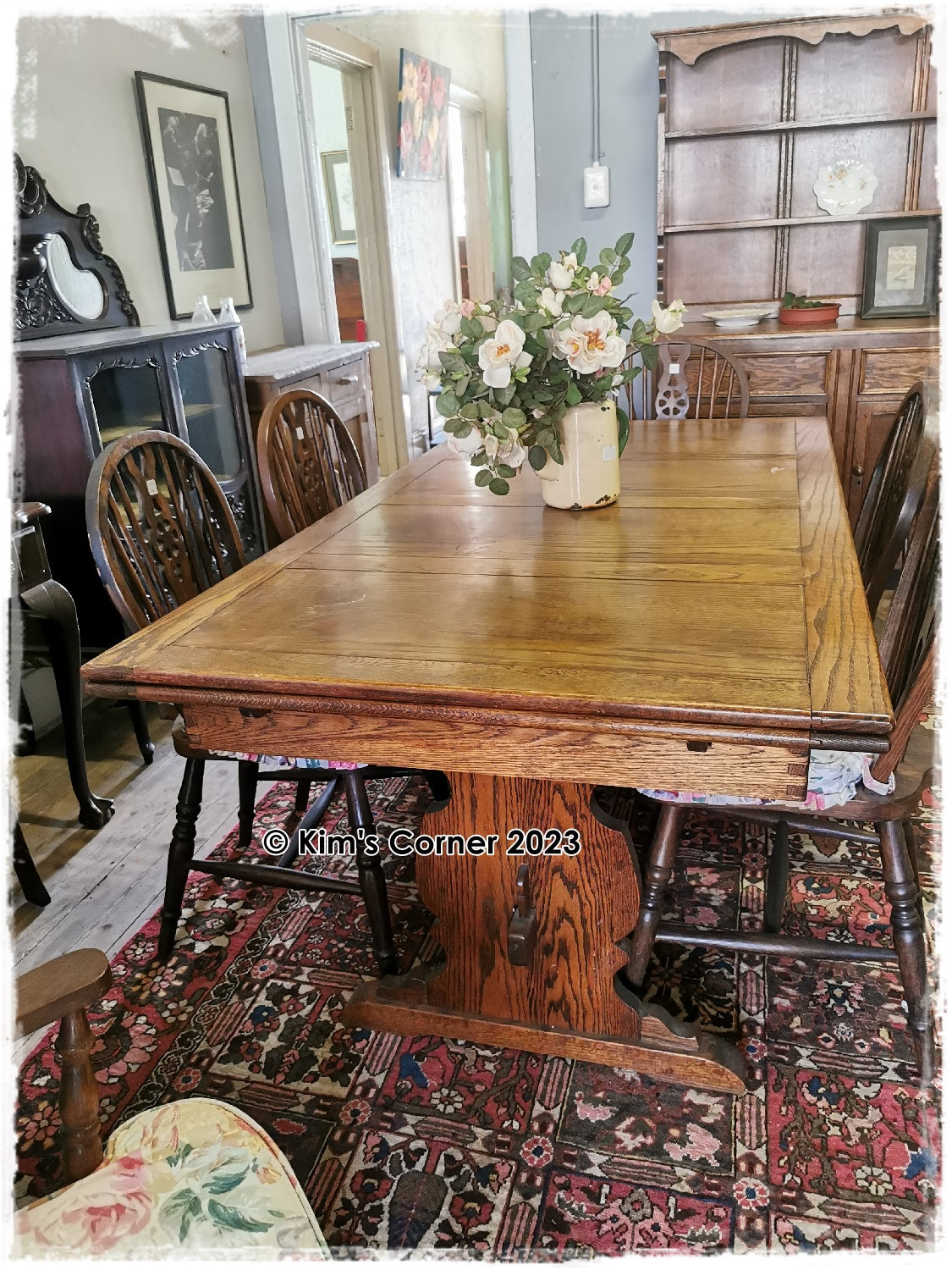 Oak dining room table and 6 chairs